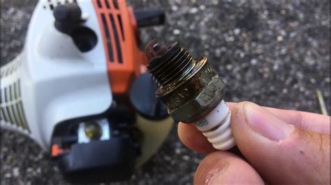 Squeeze no more than 5 g (1/5 oz. . Spark plug gap for stihl weedeater